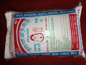 সোনার তালা চাবি মার্কা সিদ্ধ চাউল ২৫ কেজি এবং ৫০ কেজি বস্তা আছে