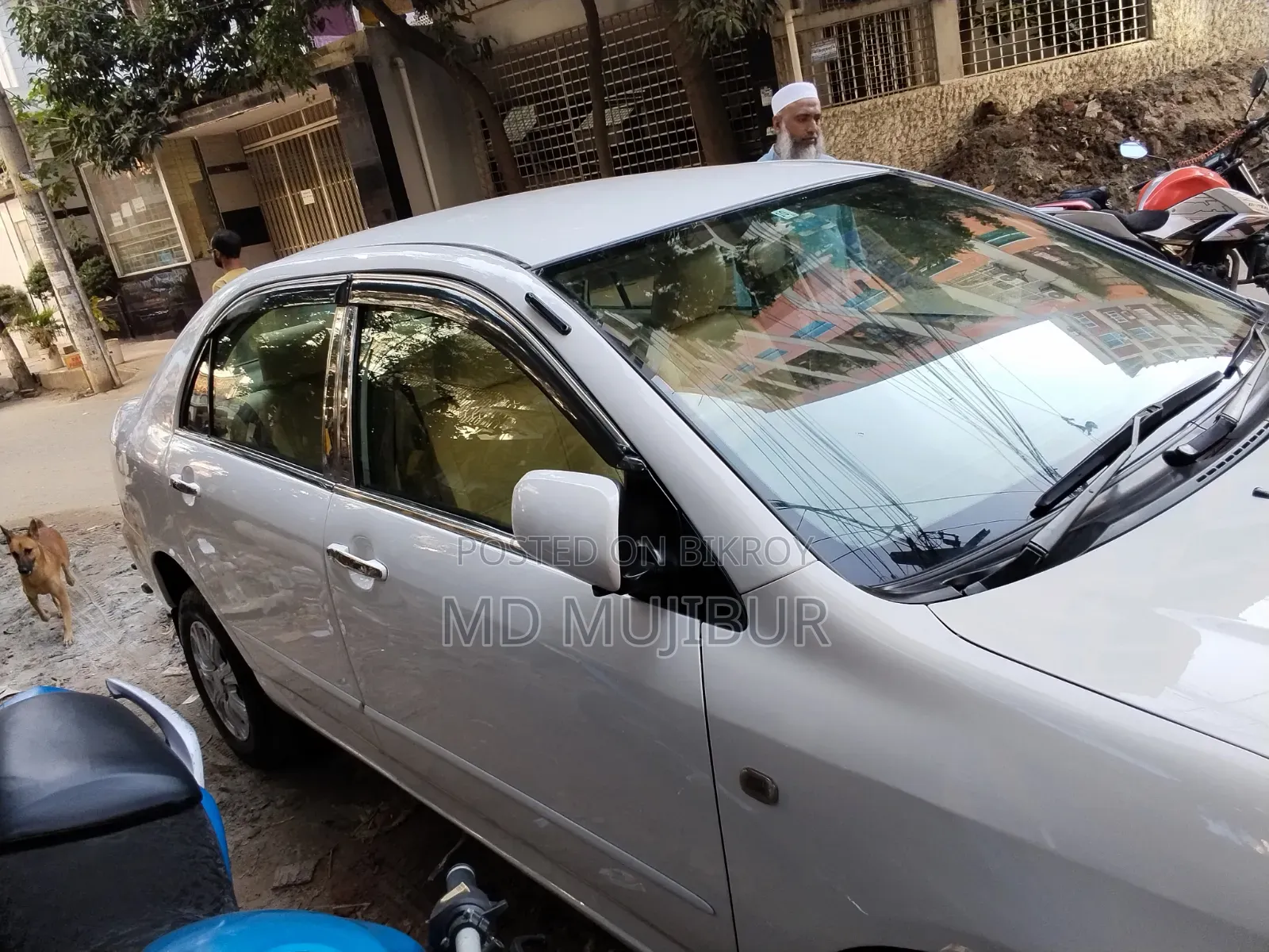 টয়োটা করোলা ২০০৪ সাদা