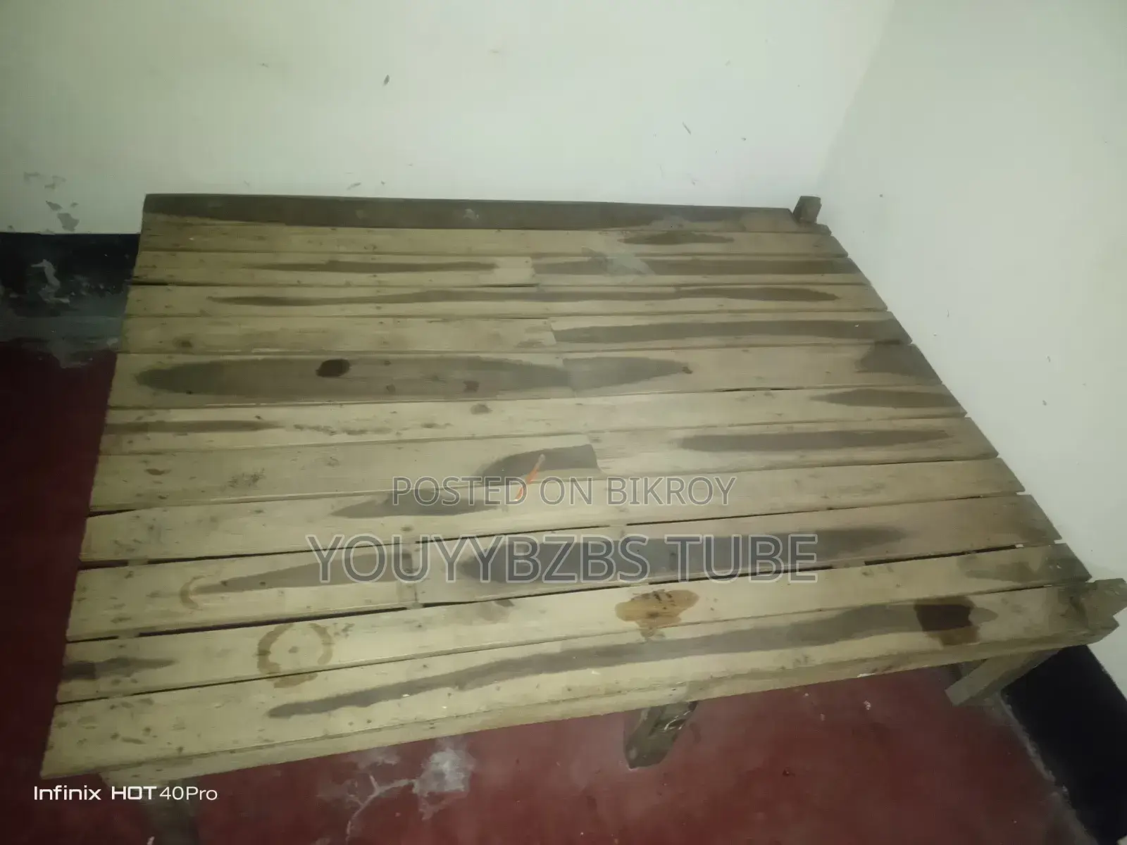 A good wooden cot will be sold