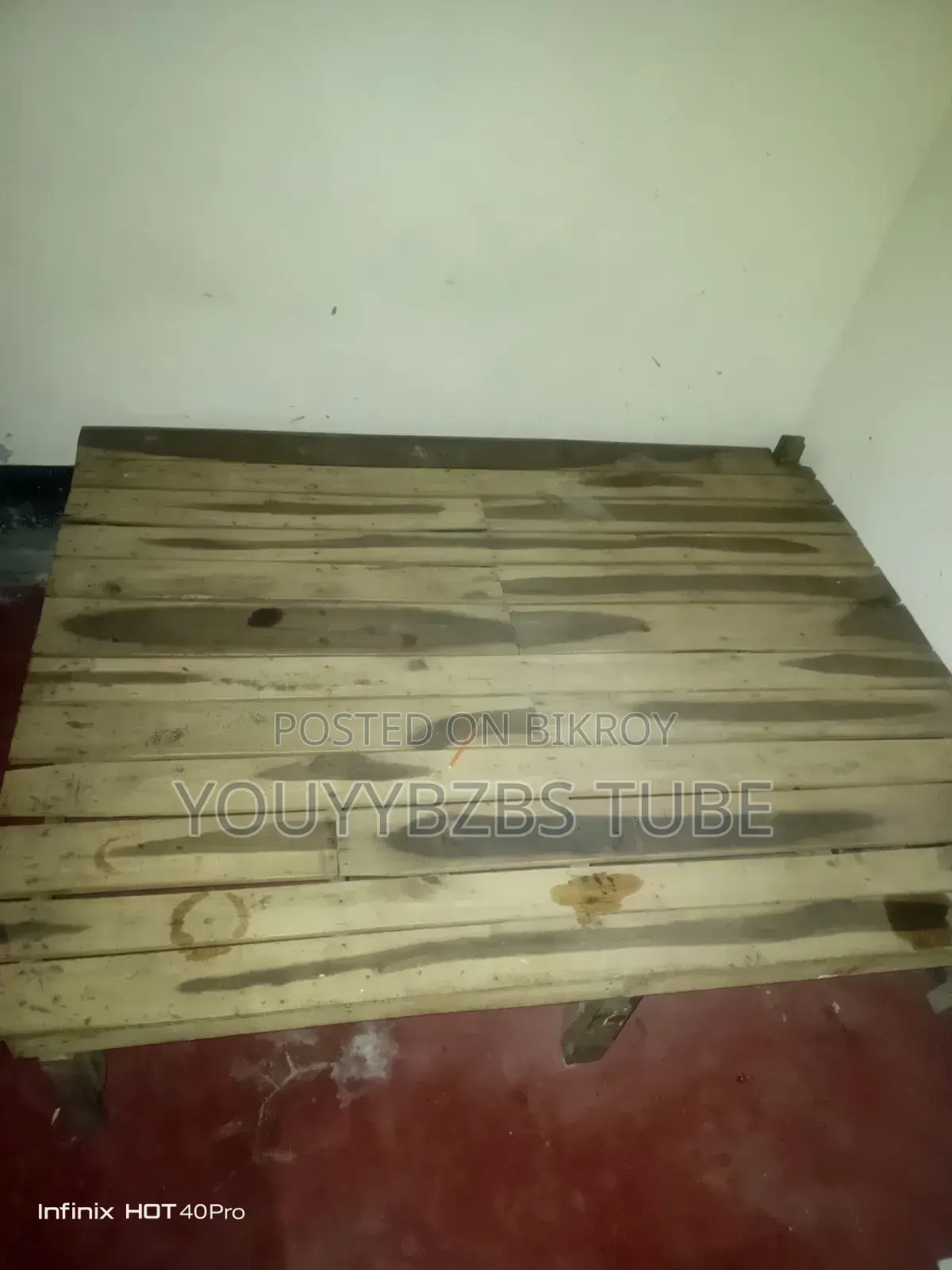 A good wooden cot will be sold