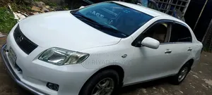 টয়োটা এক্সিও ১.৫ জি ২ডব্লিউডি ২০০৯ সাদা