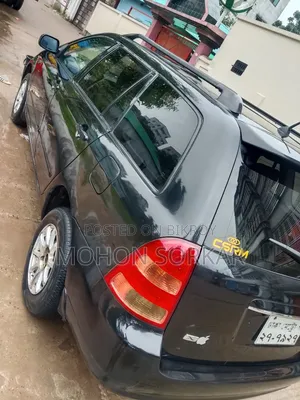 টয়োটা করোল্লা ২০০৩ কালো