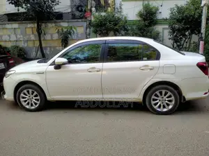 Toyota Axio 1.5 হাইব্রিড 2WD ২০১৬ সাদা