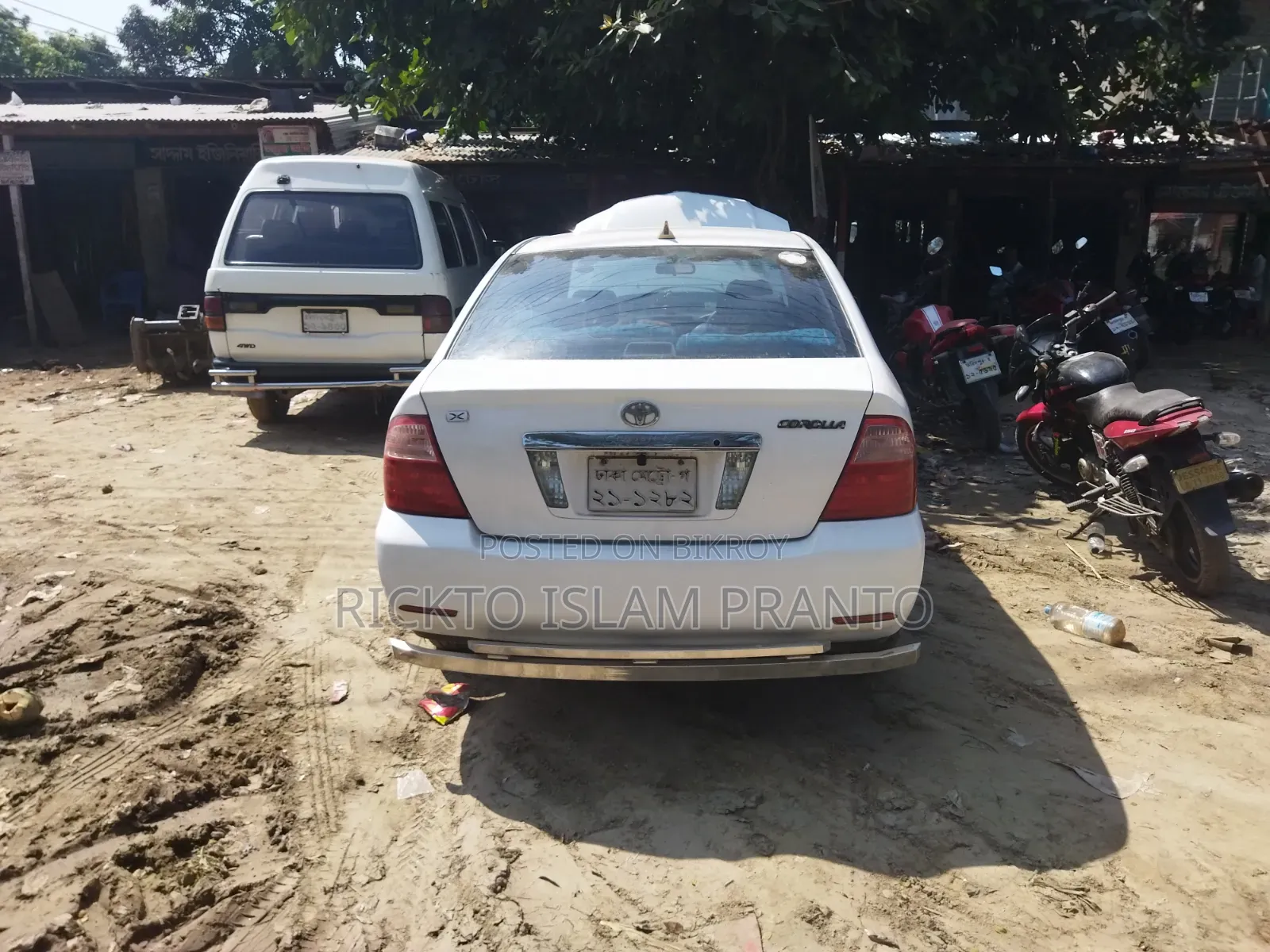 টয়োটা করোল্লা সেডান ২০০৪ সাদা