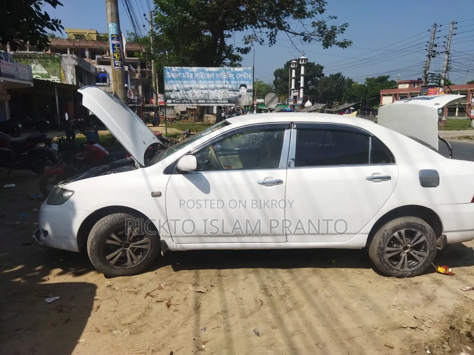 টয়োটা করোল্লা সেডান ২০০৪ সাদা