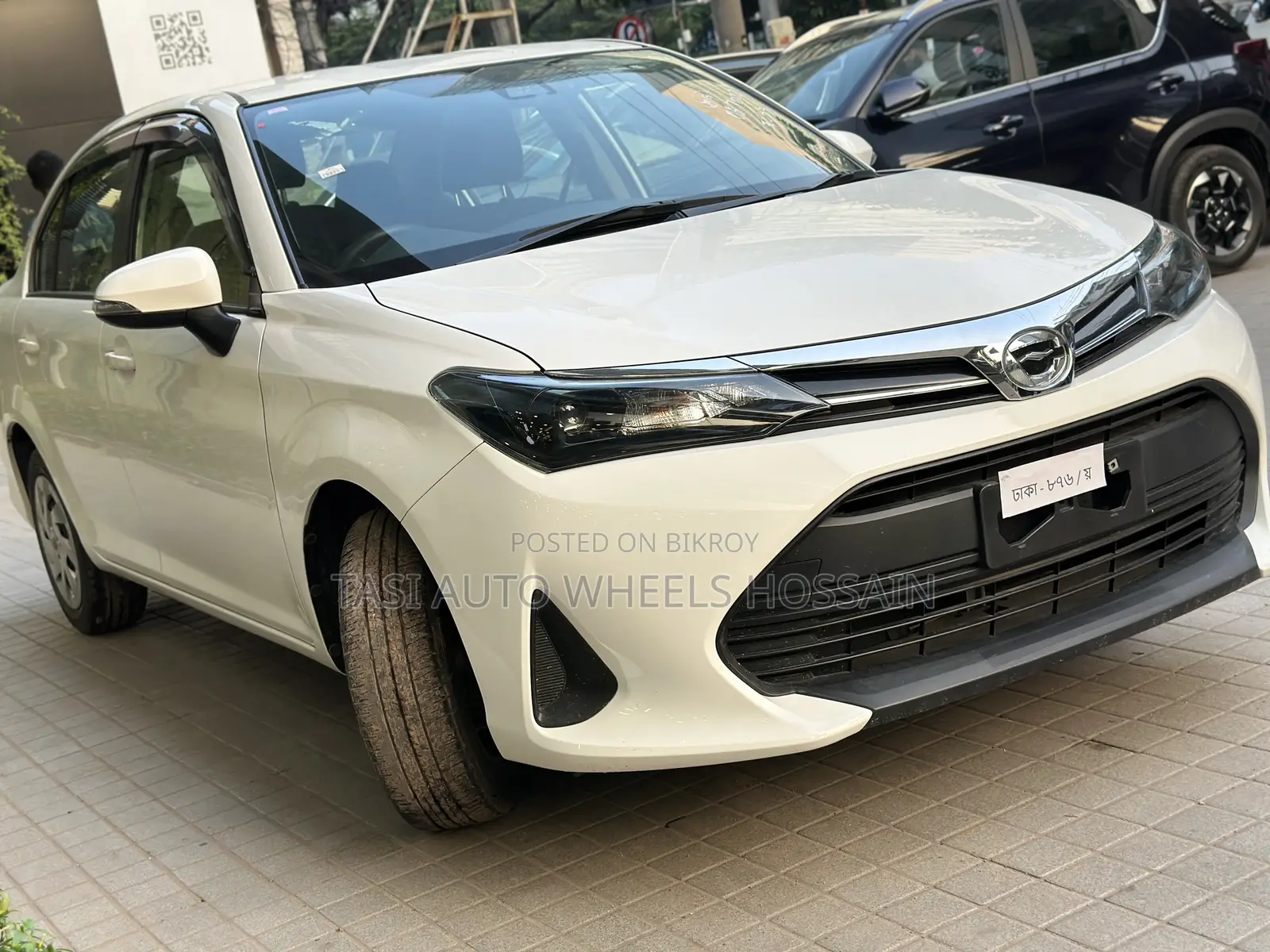 টয়োটা এক্সিও ২০২৩ সাদা