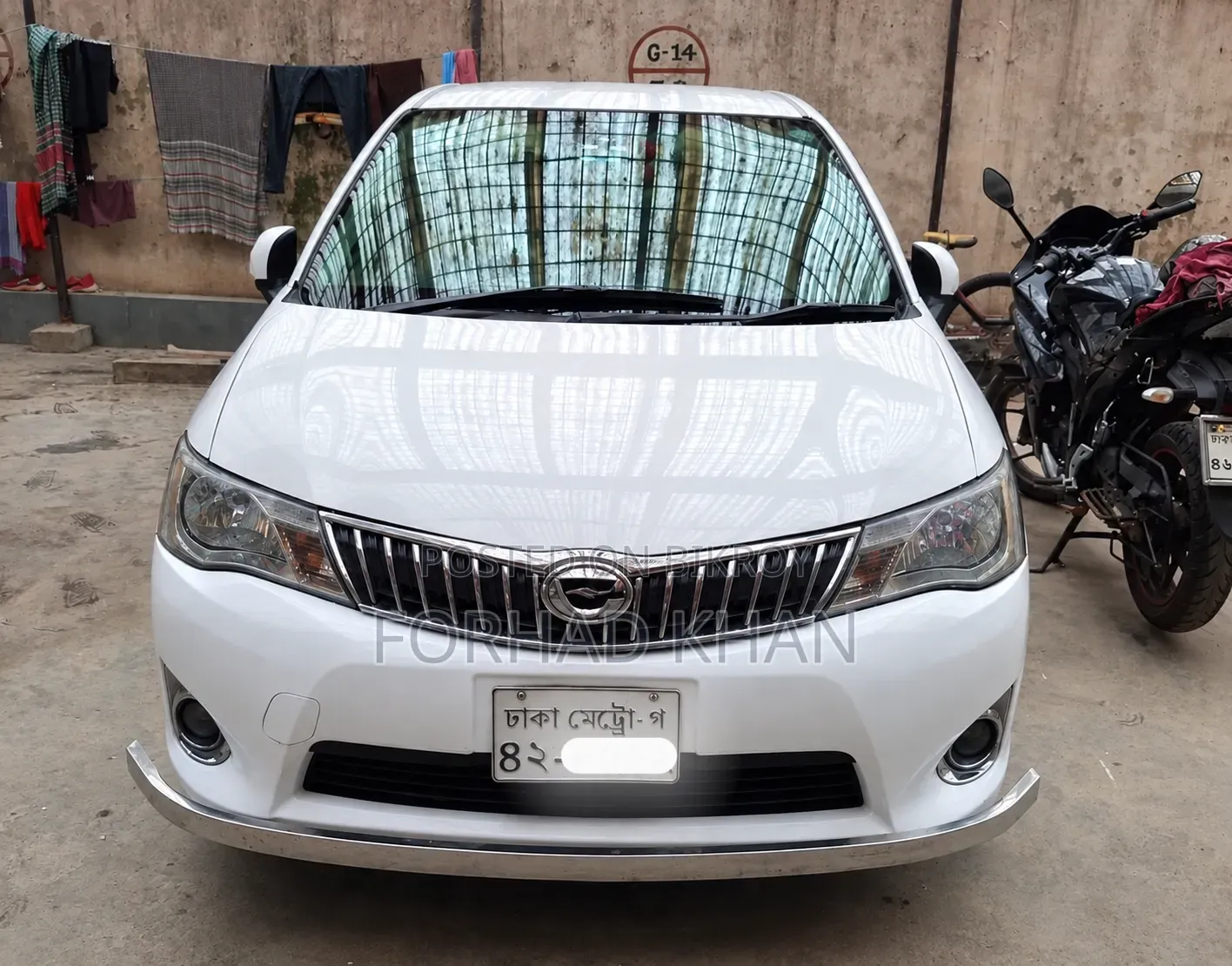 টয়োটা অ্যাক্সিও ২০১৪ সাদা