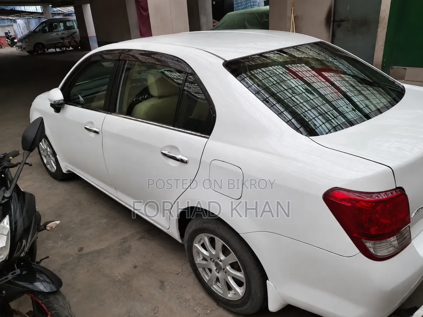 টয়োটা অ্যাক্সিও ২০১৪ সাদা