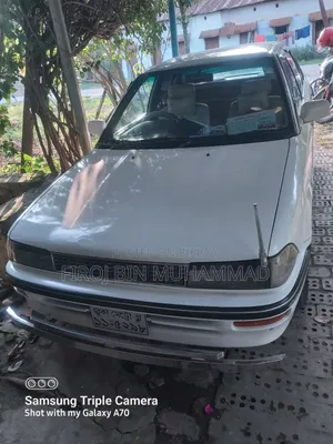 টয়োটা করলা স্টেশন ওয়াগন ১৯৯০ সাদা