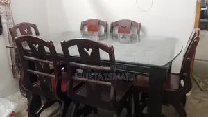 ৬ চেয়ারের ডাইনিং টেবিল