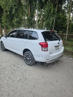 টয়োটা করোল্লা ফিল্ডার ১.৫ হাইব্রিড এফডব্লিউডি ২০১৪ হোয়াইট