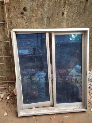 Used Iron Grill and Aluminum Thai Window