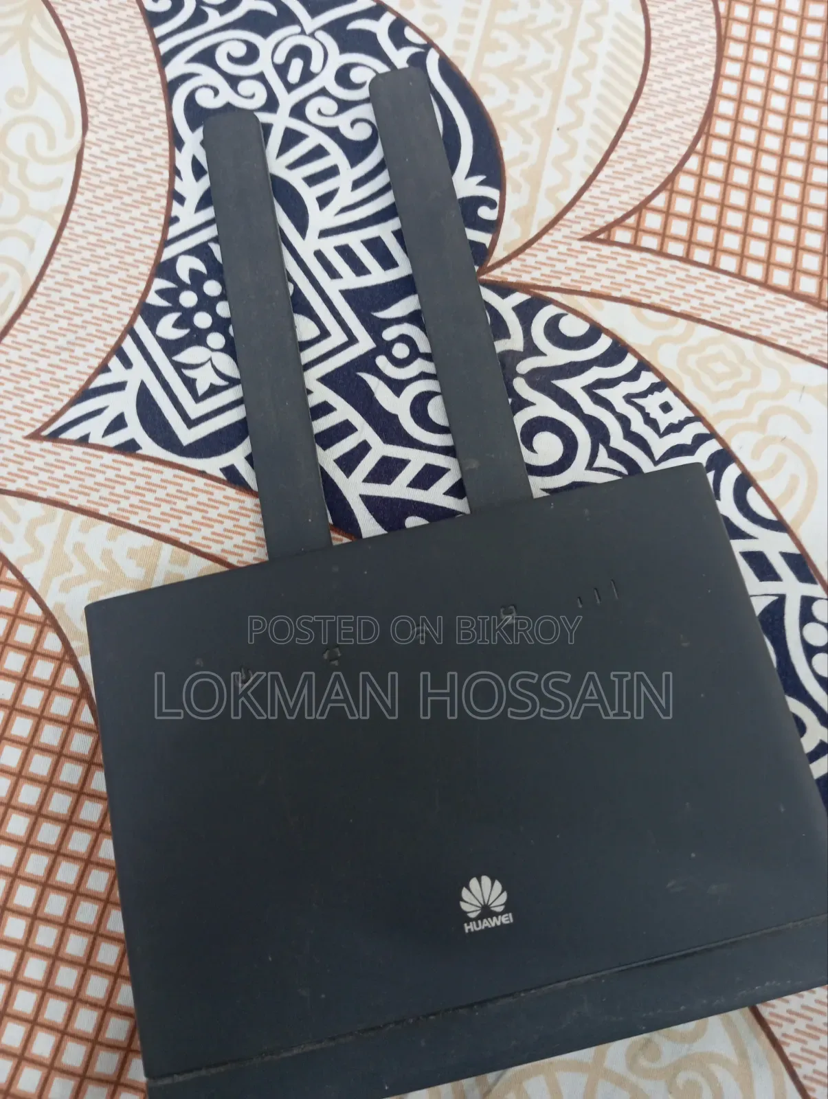 বাহির থেকে আনা Huawei রাউটার
