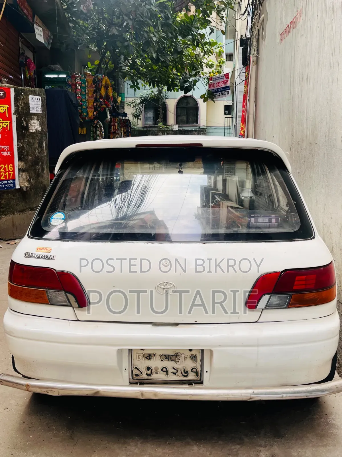 টয়োটা করোল্লা ১৯৯৫ সাদা