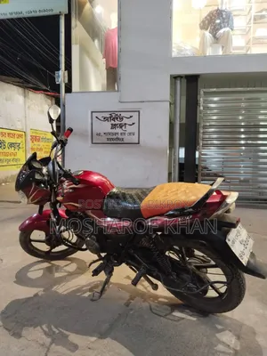 বাজাজ ডিসকভার ১০০ ২০১৭ লাল