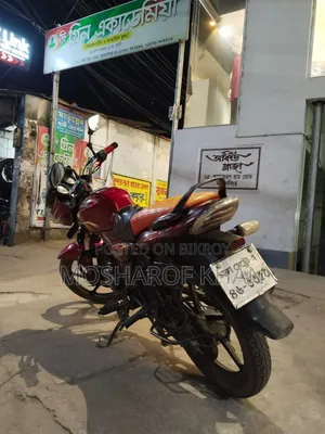 বাজাজ ডিসকভার ১০০ ২০১৭ লাল