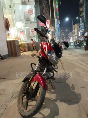 বাজাজ ডিসকভার ১০০ ২০১৭ লাল