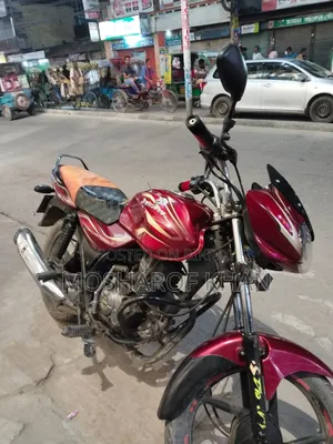 বাজাজ ডিসকভার ১০০ ২০১৭ লাল