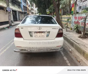 টয়োটা করোল্লা ২০০৪ হোয়াইট