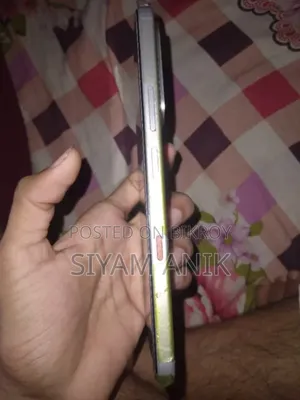 নতুন ইনফিনিক্স হট ৭০ ১২৮ জিবি কমলা