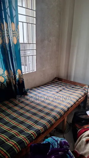 A Single Bed/ Chowki / Table