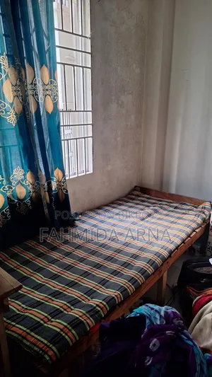 A Single Bed/ Chowki / Table