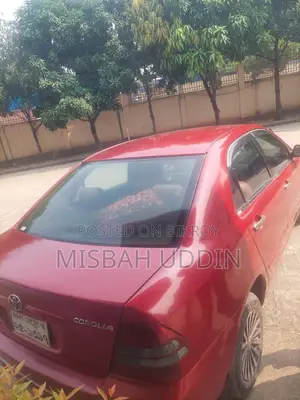 টয়োটা করোল্লা সেডান ২০০৩ রেড