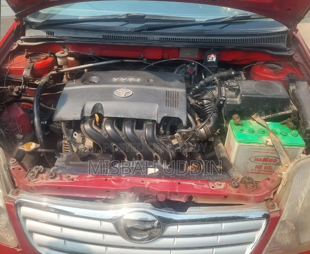 টয়োটা করোল্লা সেডান ২০০৩ রেড