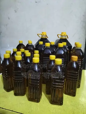 Pure mustard oil extracted through wooden churn (ghani).