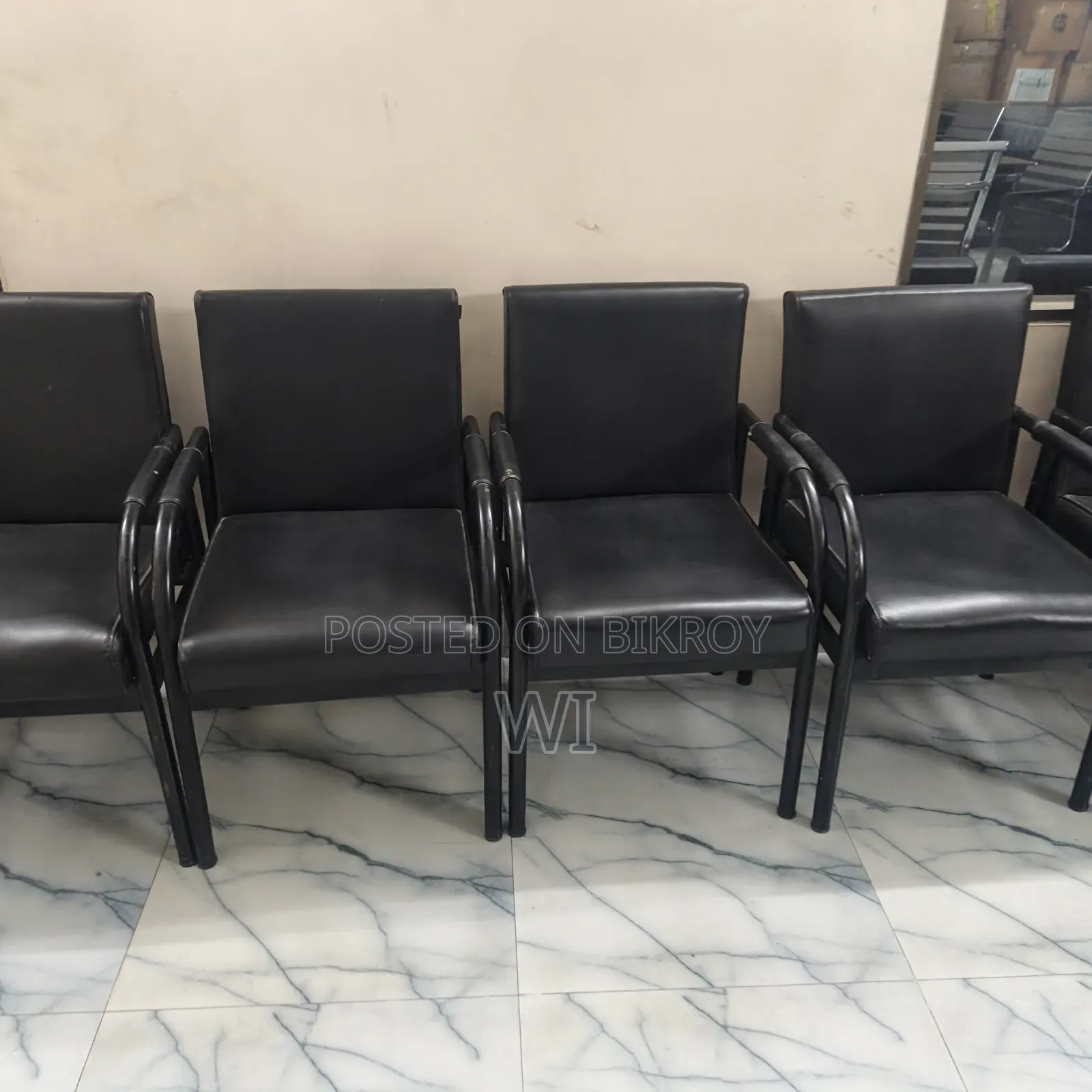 Five tables. One conference table. Twenty chairs of two types. One small super table