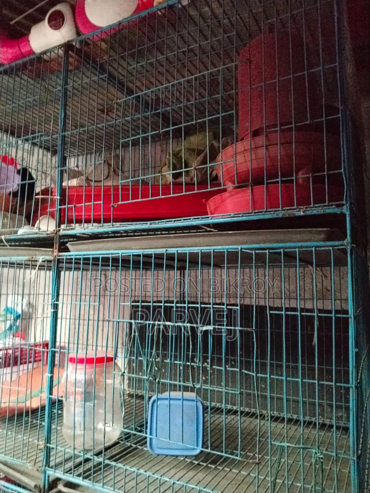 Good condition blue iron wire cage for birds/chickens for sale.