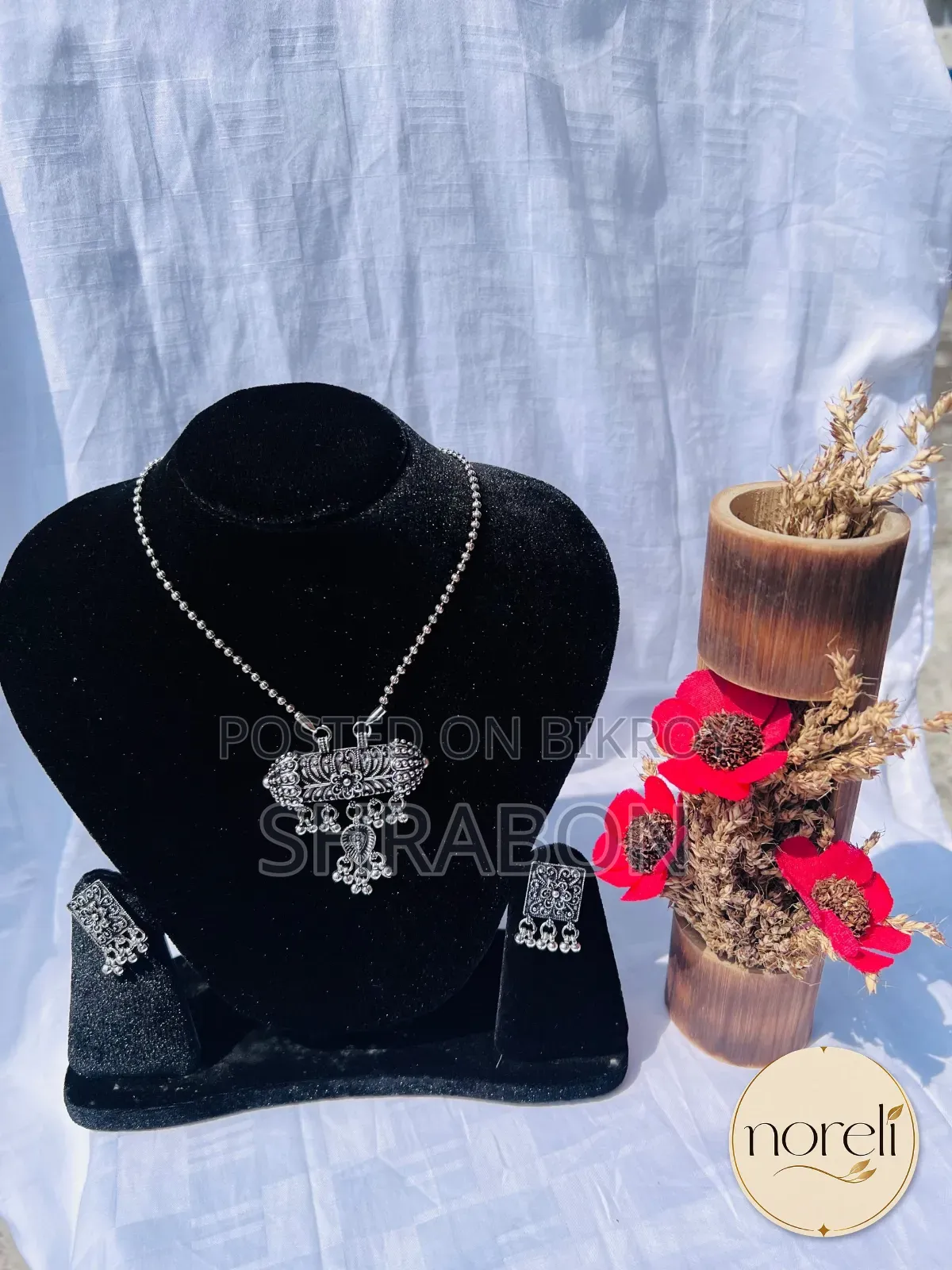 German silver jhumka and necklace combining traditional beauty!