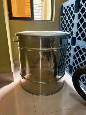 This Is a Steel Drum With Two Side Handles With a Lid. No Damages