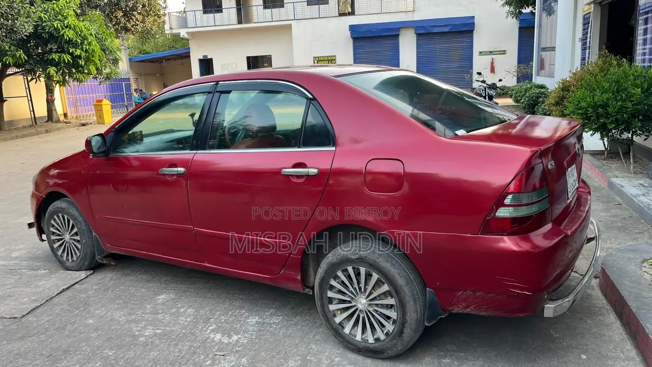 টয়োটা করোল্লা সেডান অটোমেটিক ২০০৩ লাল