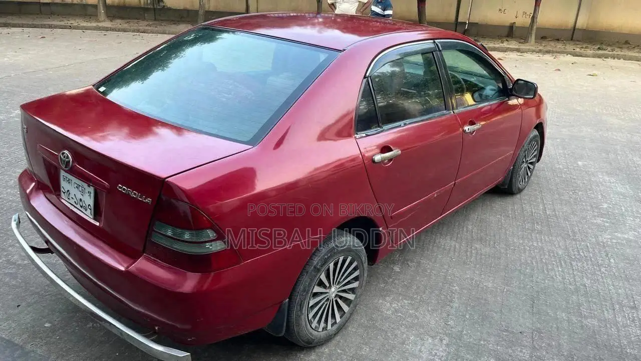 টয়োটা করোল্লা সেডান অটোমেটিক ২০০৩ লাল