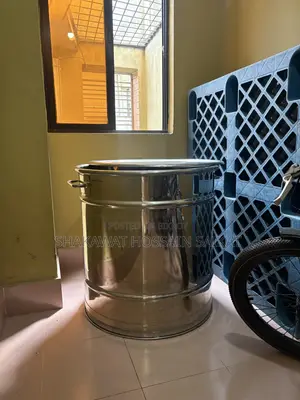 This Is a Steel Drum With Two Side Handles With a Lid. No Damages