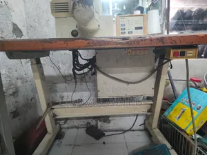বুটাম মেশিন