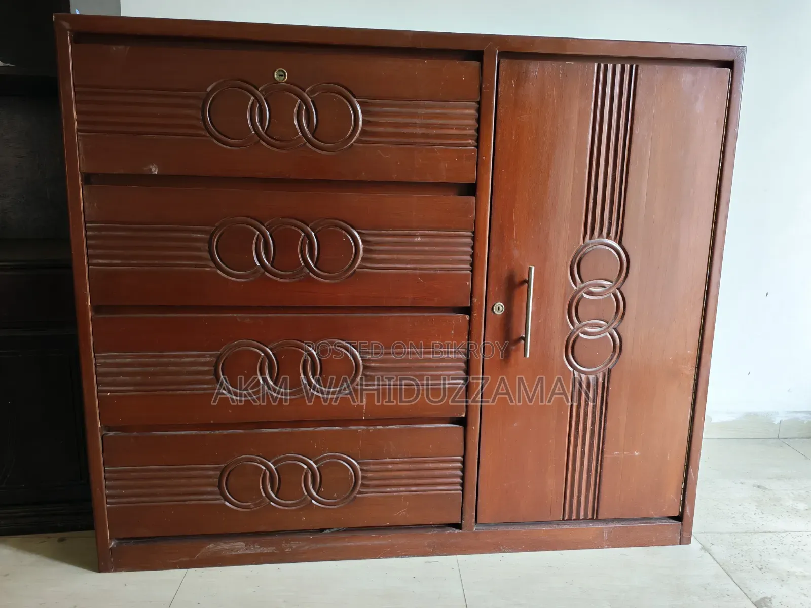 A teak wood wardrobe for sale