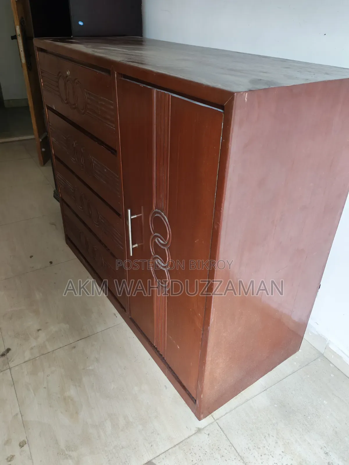 A teak wood wardrobe for sale