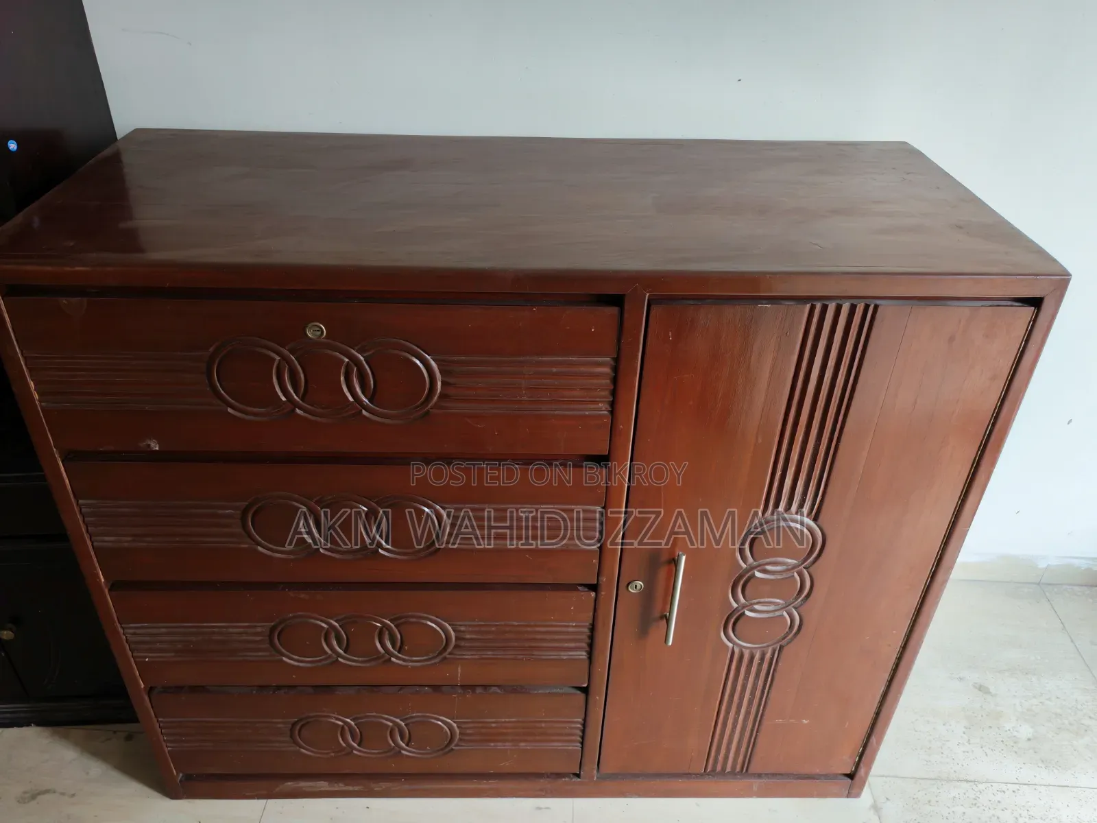 A teak wood wardrobe for sale