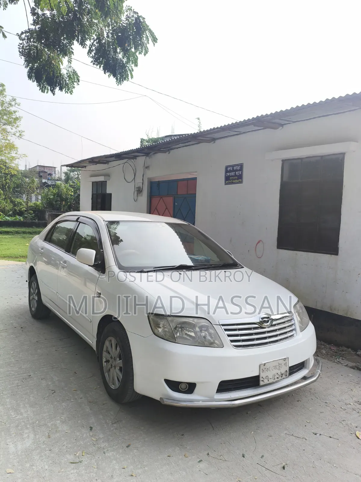 টয়োটা করোল্লা ২০০৪ সাদা