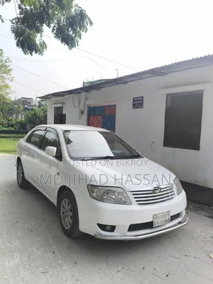 টয়োটা করোল্লা ২০০৪ সাদা
