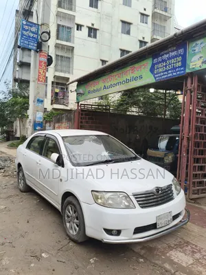 টয়োটা করোল্লা ২০০৪ সাদা